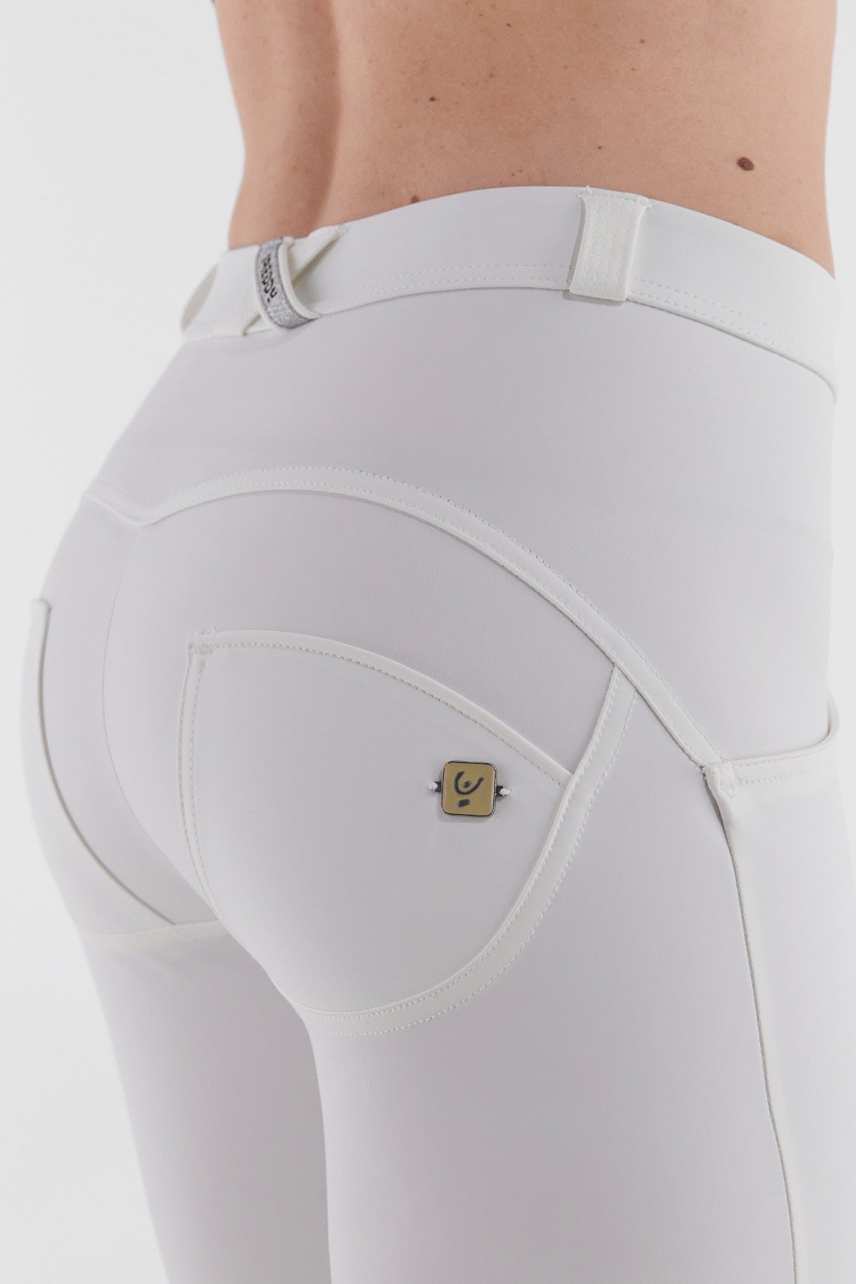 white faux leather mid rise freddy jeans 